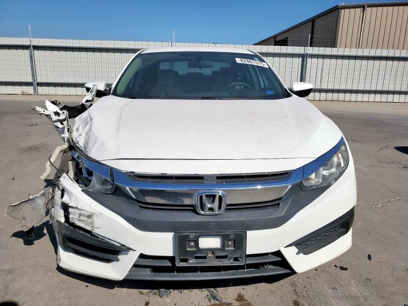 Photo 5 from auction – 2018 HONDA CIVIC LX with VIN 19XFC2F59JE004637