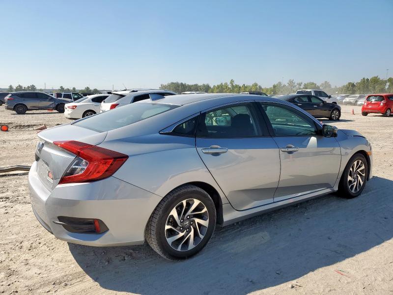 Photo 3 from auction – 2018 HONDA CIVIC EX with VIN 19XFC2F70JE027497