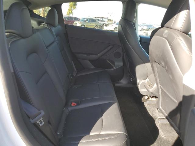 Photo 10 from auction – 2023 TESLA MODEL Y with VIN 7SAYGDEE6PF676283