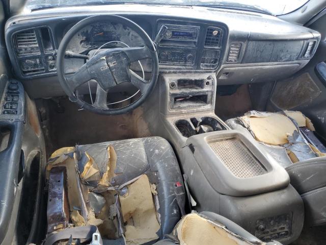 Photo 8 from auction – 2003 GMC YUKON with VIN 1GKEC13Z03R143547