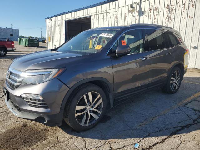 Photo 1 from auction – 2017 HONDA PILOT TOURING with VIN 5FNYF6H96HB012321
