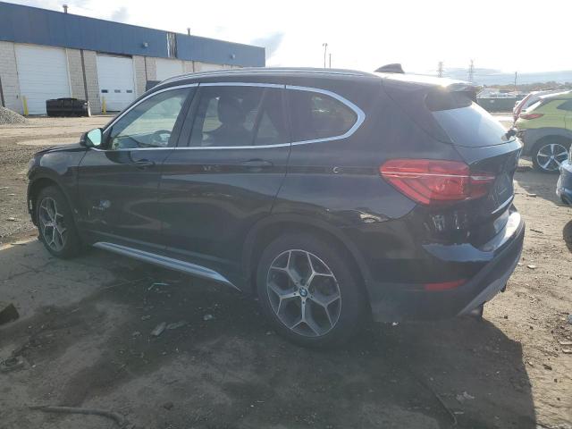 Photo 2 from auction – 2017 BMW X1 XDRIVE2 with VIN WBXHT3C35H5F72638