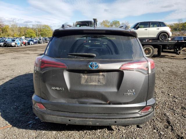 Photo 6 from auction – 2018 TOYOTA RAV4 with VIN JTMRJREV2JD164907