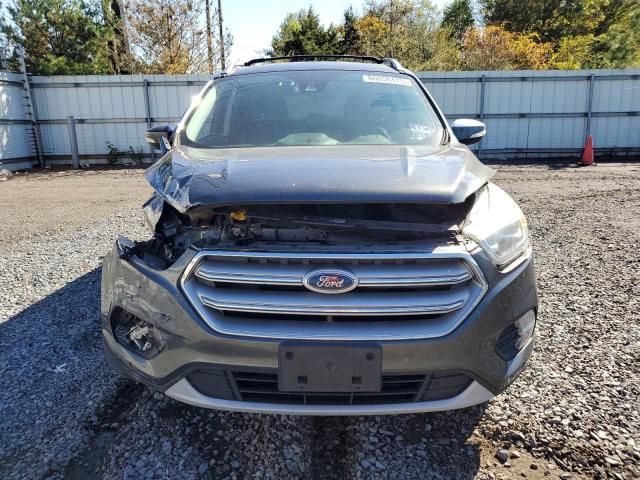 Photo 5 from auction – 2017 FORD ESCAPE TITANIUM with VIN 1FMCU9J91HUD99147