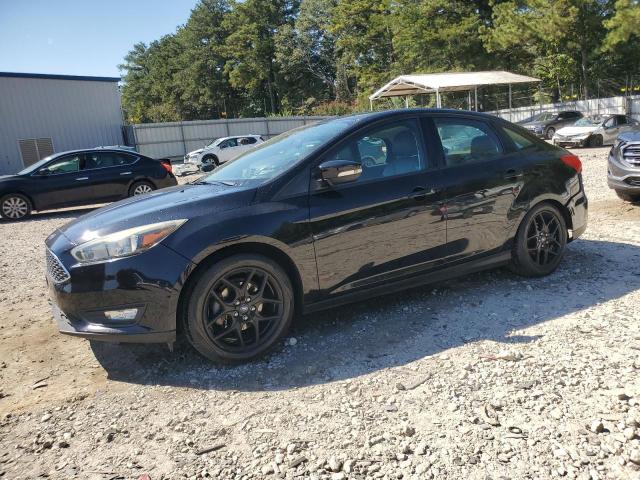 FORD FOCUS SE 2016 with VIN 1FADP3F27GL248199 - Photo from auction