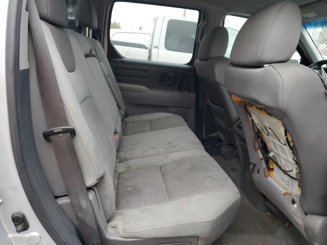 Photo 10 from auction – 2010 HONDA RIDGELINE with VIN 5FPYK1F40AB012172