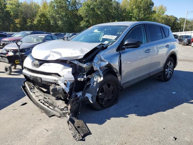 TOYOTA RAV4 LE 2018 with VIN 2T3BFREV8JW723043 - Photo from auction