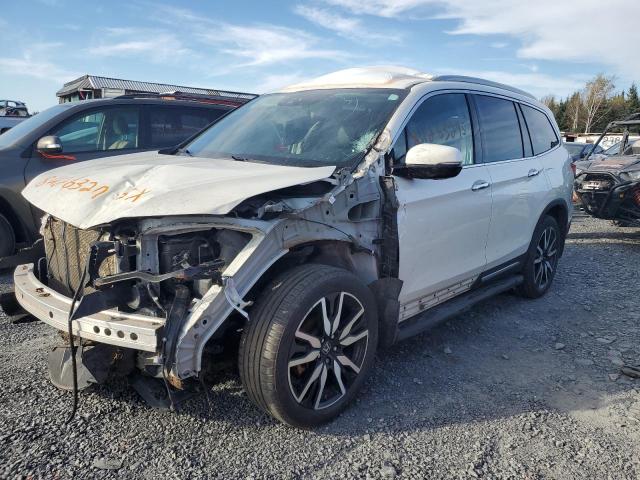HONDA PILOT TOUR 2019 with VIN 5FNYF6H95KB501509 - Photo from auction
