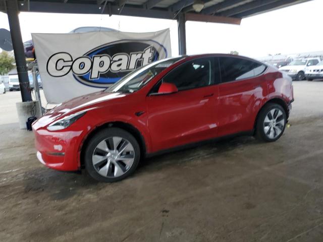 TESLA MODEL Y 2023 with VIN 7SAYGDEE9PF715299 - Photo from auction