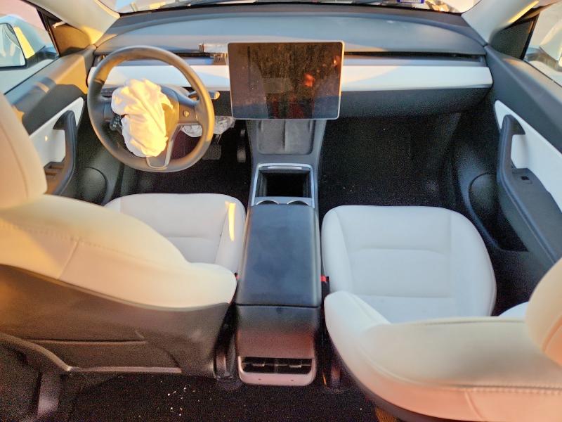 Photo 8 from auction – 2022 TESLA MODEL Y with VIN 7SAYGDEE3NF458783