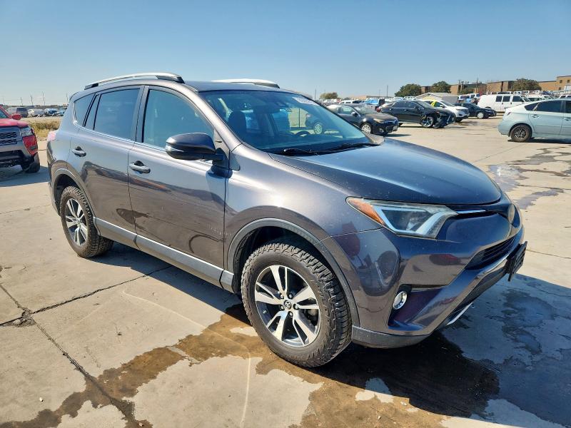 Photo 4 from auction – 2017 TOYOTA RAV4 XLE with VIN JTMWFREV2HJ147086
