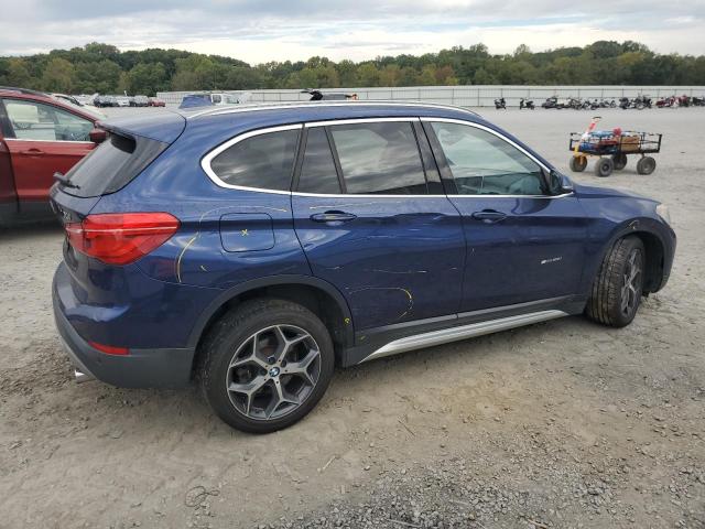 Photo 3 from auction – 2017 BMW X1 with VIN WBXHU7C30H5H32610