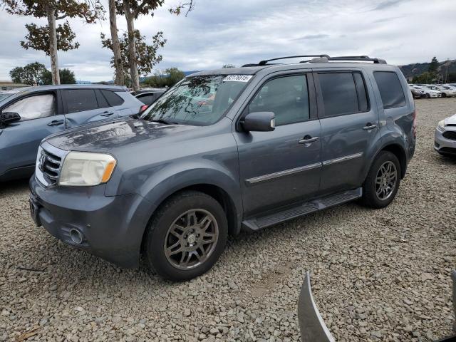 HONDA PILOT TOUR 2013 with VIN 5FNYF4H96DB021163 - Photo from auction