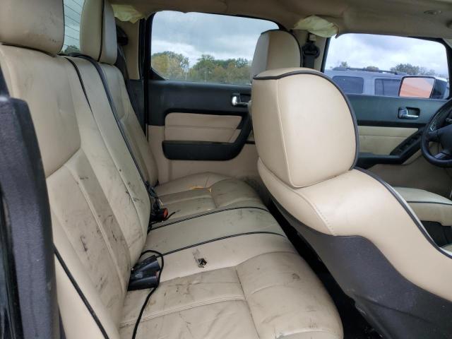 Photo 11 from auction – 2009 HUMMER H3T with VIN 5GNEN13E198147687