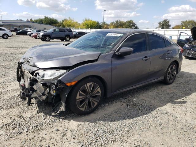 HONDA CIVIC EX 2017 with VIN 19XFC1F34HE202612 - Photo from auction