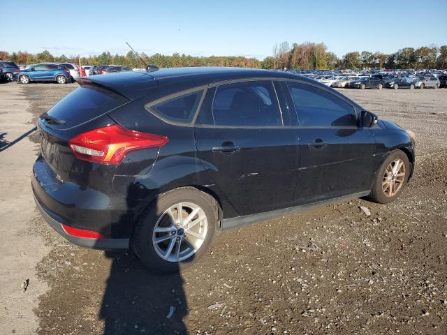 Photo 3 from auction – 2016 FORD FOCUS SE with VIN 1FADP3K26GL328096