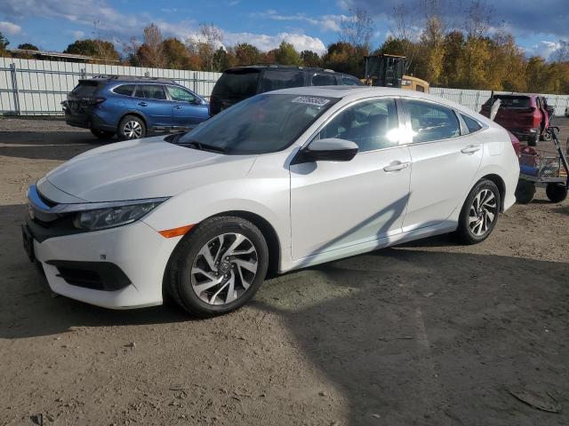 HONDA CIVIC EX 2018 with VIN 19XFC2F72JE207046 - Photo from auction