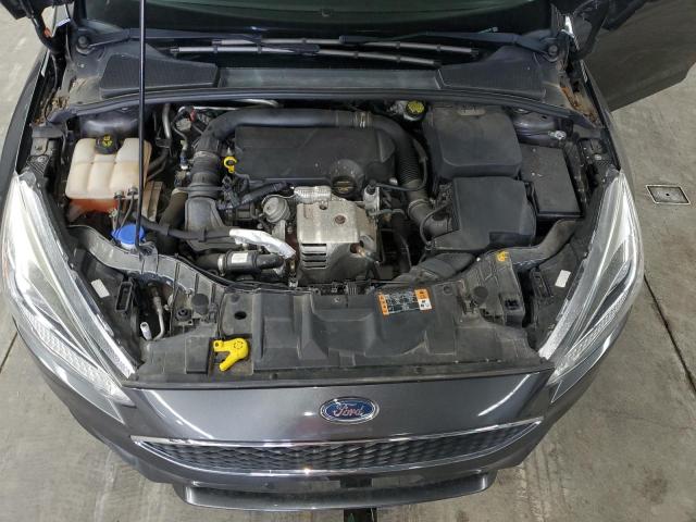 Photo 11 from auction – 2015 FORD FOCUS SE with VIN 1FADP3FE8FL355142