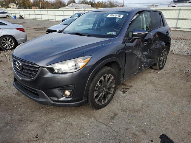 MAZDA CX-5 2016 с VIN JM3KE4DY9G0794614 - Фото с аукциона