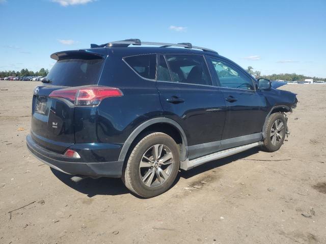 Photo 3 from auction – 2017 TOYOTA RAV4 XLE with VIN 2T3RFREV2HW685950
