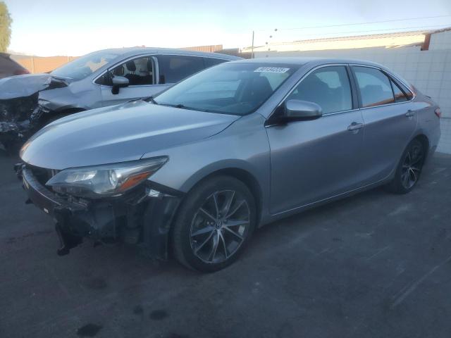 TOYOTA CAMRY LE 2015 with VIN 4T1BF1FK0FU496887 - Photo from auction