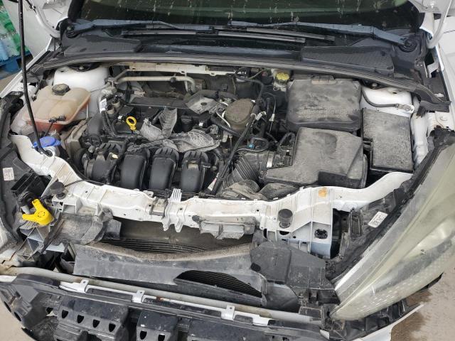 Photo 11 from auction – 2015 FORD FOCUS S with VIN 1FADP3E20FL231227