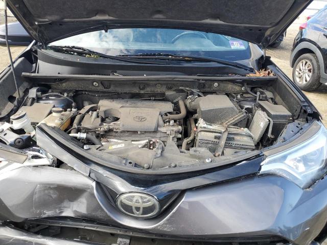Photo 12 from auction – 2018 TOYOTA RAV4 SE with VIN JTMJFREV8JJ259617