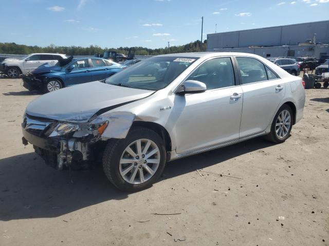 TOYOTA CAMRY HYBR 2012 with VIN 4T1BD1FKXCU039764 - Photo from auction