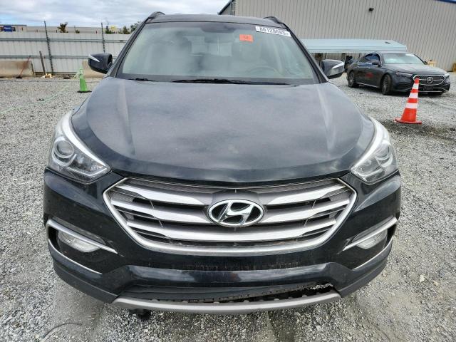 Photo 5 from auction – 2017 HYUNDAI SANTA FE S with VIN 5NMZU3LB3HH008650