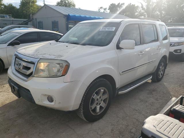 HONDA PILOT TOUR 2011 with VIN 5FNYF3H98BB032379 - Photo from auction
