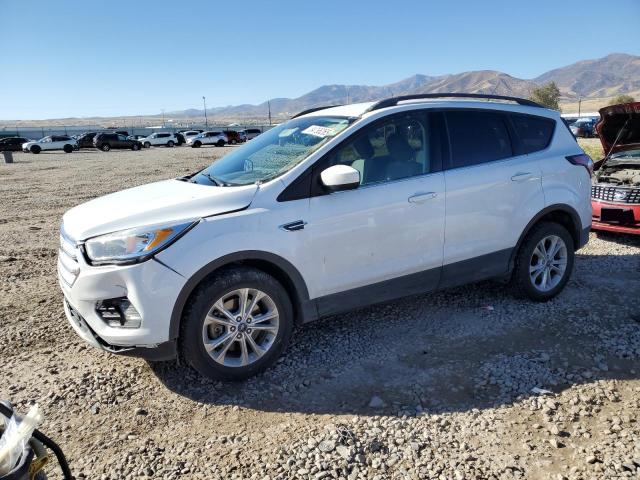 FORD ESCAPE 2018 with VIN 1FMCU9GD9JUA74182 - Photo from auction