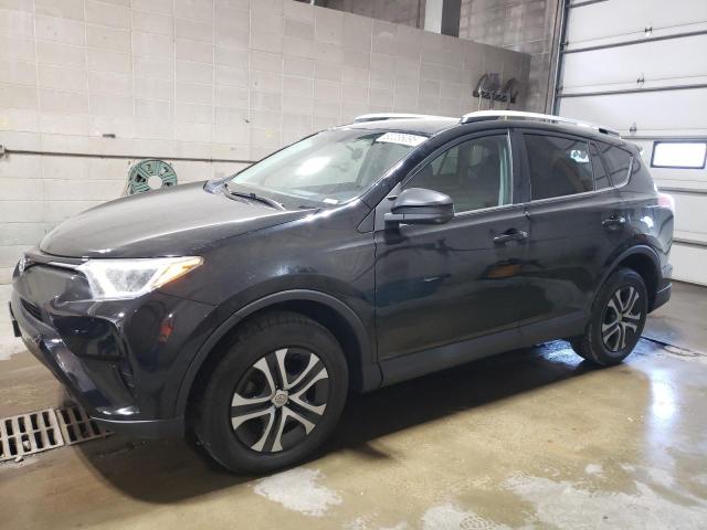 TOYOTA RAV4 LE 2016 with VIN 2T3BFREV2GW490673 - Photo from auction