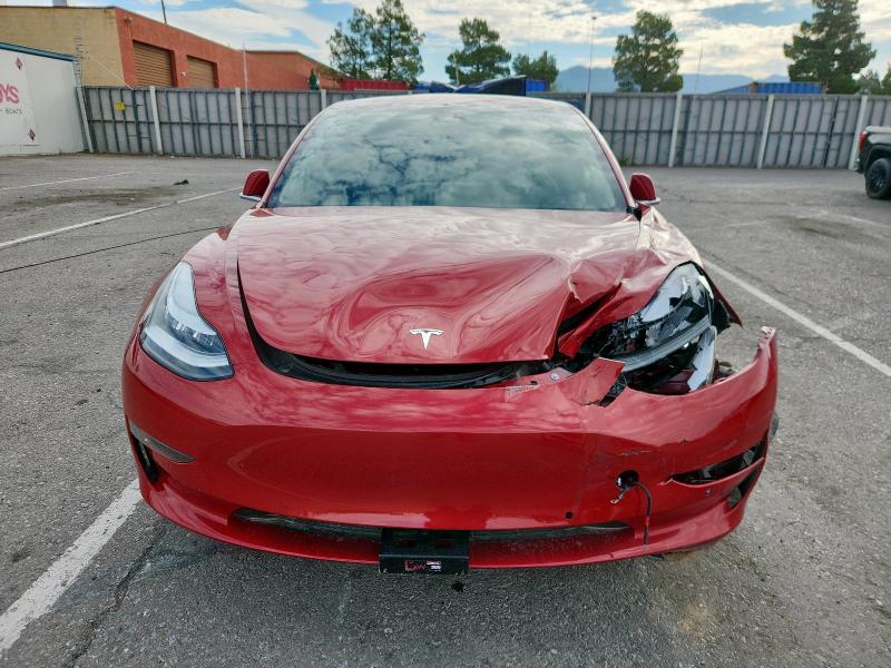Photo 5 from auction – 2018 TESLA MODEL 3 with VIN 5YJ3E1EB0JF146125