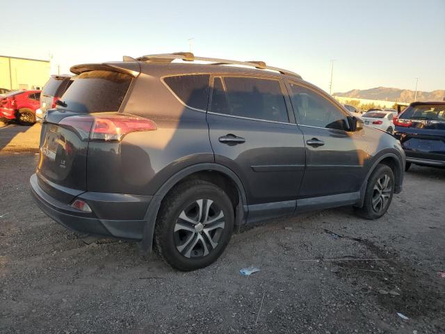 Photo 3 from auction – 2017 TOYOTA RAV4 LE with VIN 2T3BFREV6HW568924