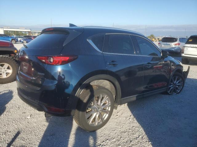 Photo 3 from auction – 2021 MAZDA CX-5 GRAND with VIN JM3KFADMXM0412272