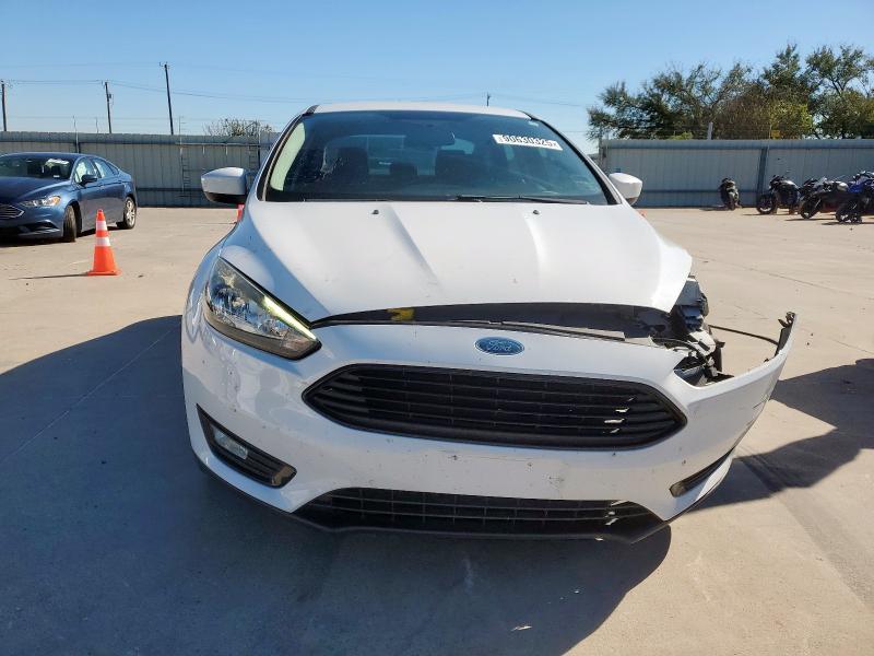 Photo 5 from auction – 2018 FORD FOCUS SE with VIN 1FADP3FE9JL229607