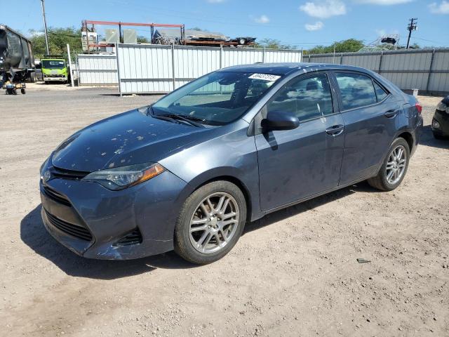 TOYOTA COROLLA 2018 with VIN 5YFBURHE4JP761249 - Photo from auction