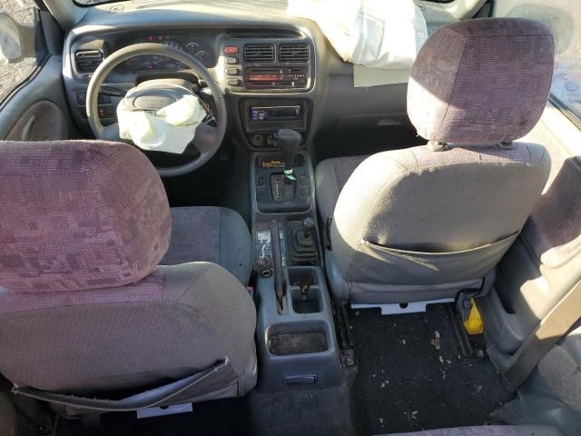 Photo 8 from auction – 2000 CHEVROLET TRACKER with VIN 2CNBJ18C4Y6904684