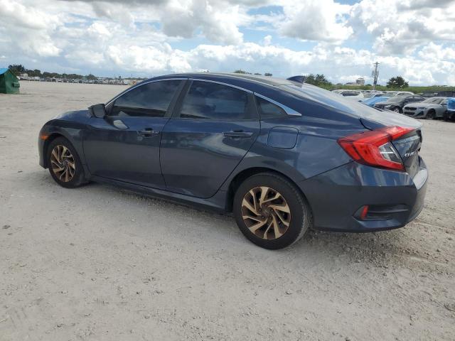 Photo 2 from auction – 2018 HONDA CIVIC EX with VIN 19XFC2F72JE035858