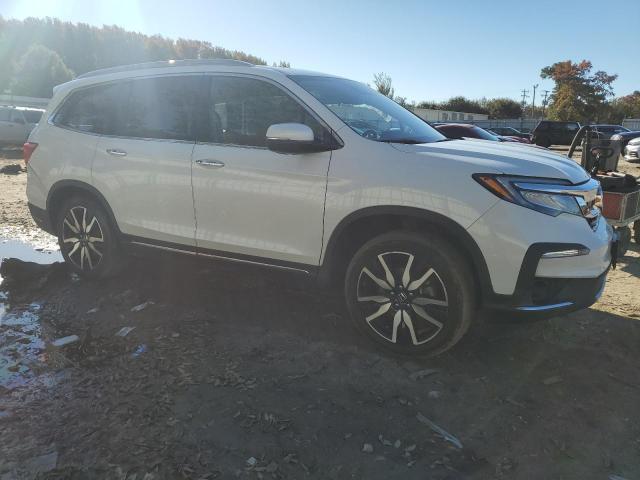 Photo 4 from auction – 2022 HONDA PILOT ELIT with VIN 5FNYF6H04NB061269