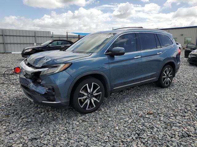 HONDA PILOT TOUR 2021 with VIN 5FNYF5H94MB007493 - Photo from auction