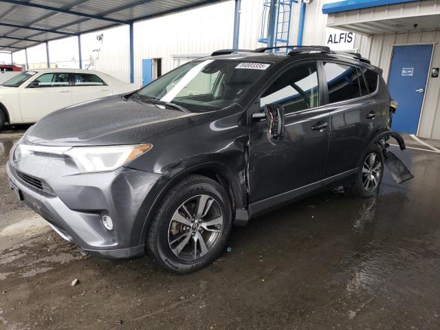 TOYOTA RAV4 XLE 2017 with VIN JTMWFREV8HD093808 - Photo from auction