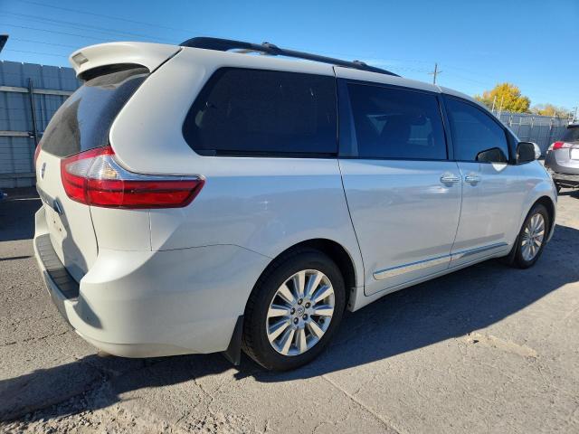 Photo 3 from auction – 2015 TOYOTA SIENNA XLE with VIN 5TDDK3DC9FS115820