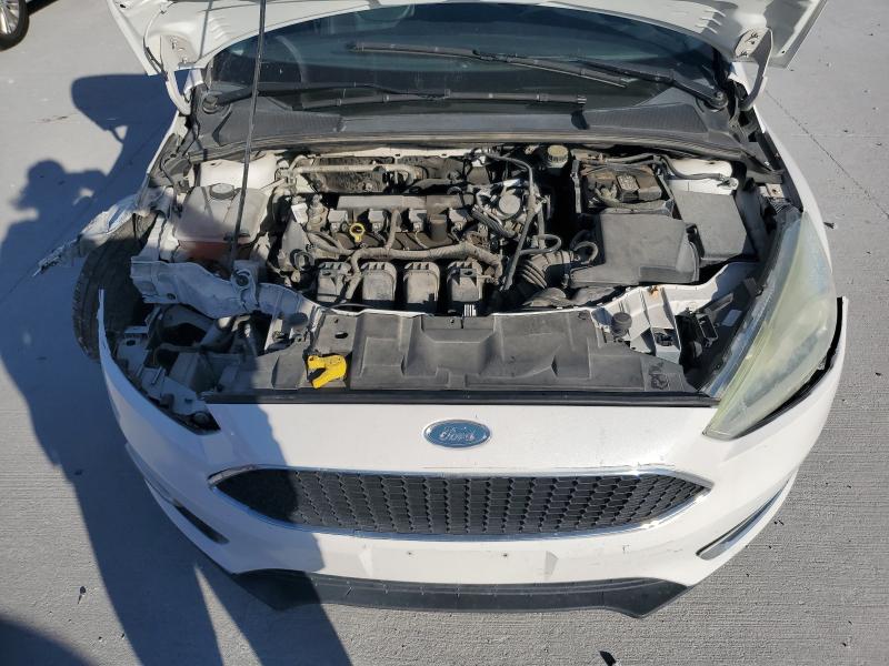 Photo 11 from auction – 2016 FORD FOCUS TITA with VIN 1FADP3J2XGL398752