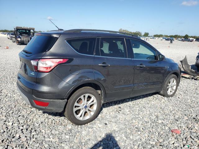 Photo 3 from auction – 2018 FORD ESCAPE SE with VIN 1FMCU0GD9JUC49901