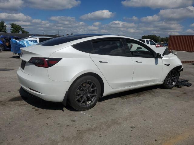 Photo 3 from auction – 2023 TESLA MODEL 3 with VIN 5YJ3E1EAXPF563560