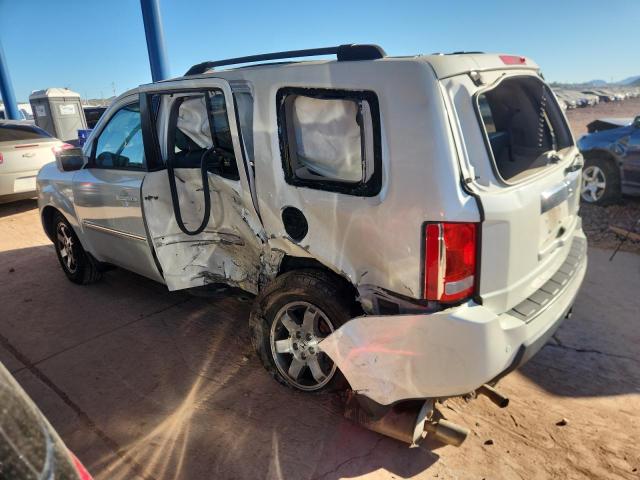 Photo 2 from auction – 2011 HONDA PILOT TOUR with VIN 5FNYF4H9XBB074039
