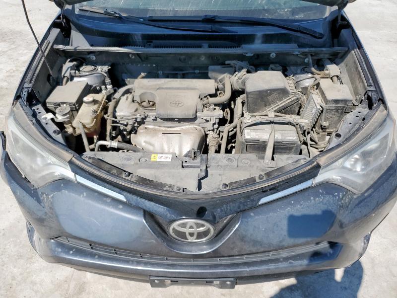 Photo 12 from auction – 2017 TOYOTA RAV4 LE with VIN JTMZFREV2HD094742