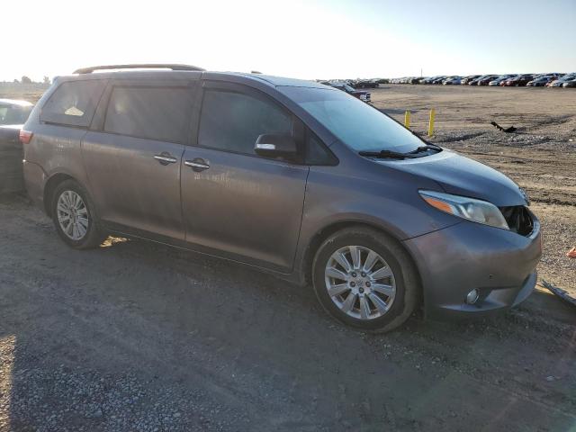 Photo 4 from auction – 2015 TOYOTA SIENNA XLE with VIN 5TDYK3DC5FS545328