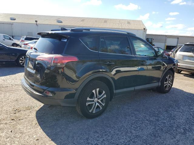 Photo 3 from auction – 2018 TOYOTA RAV4 LE with VIN 2T3BFREV0JW716281